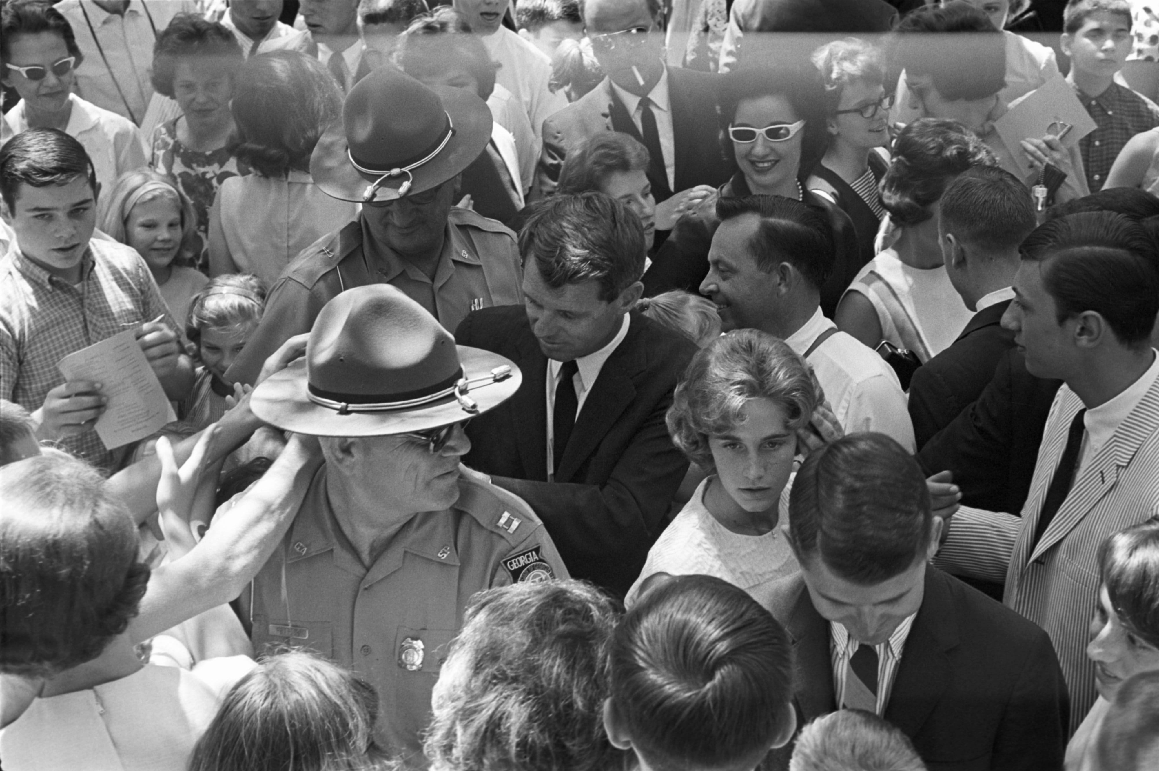Robert Kennedy caught in the crowd at the dedication ceremony