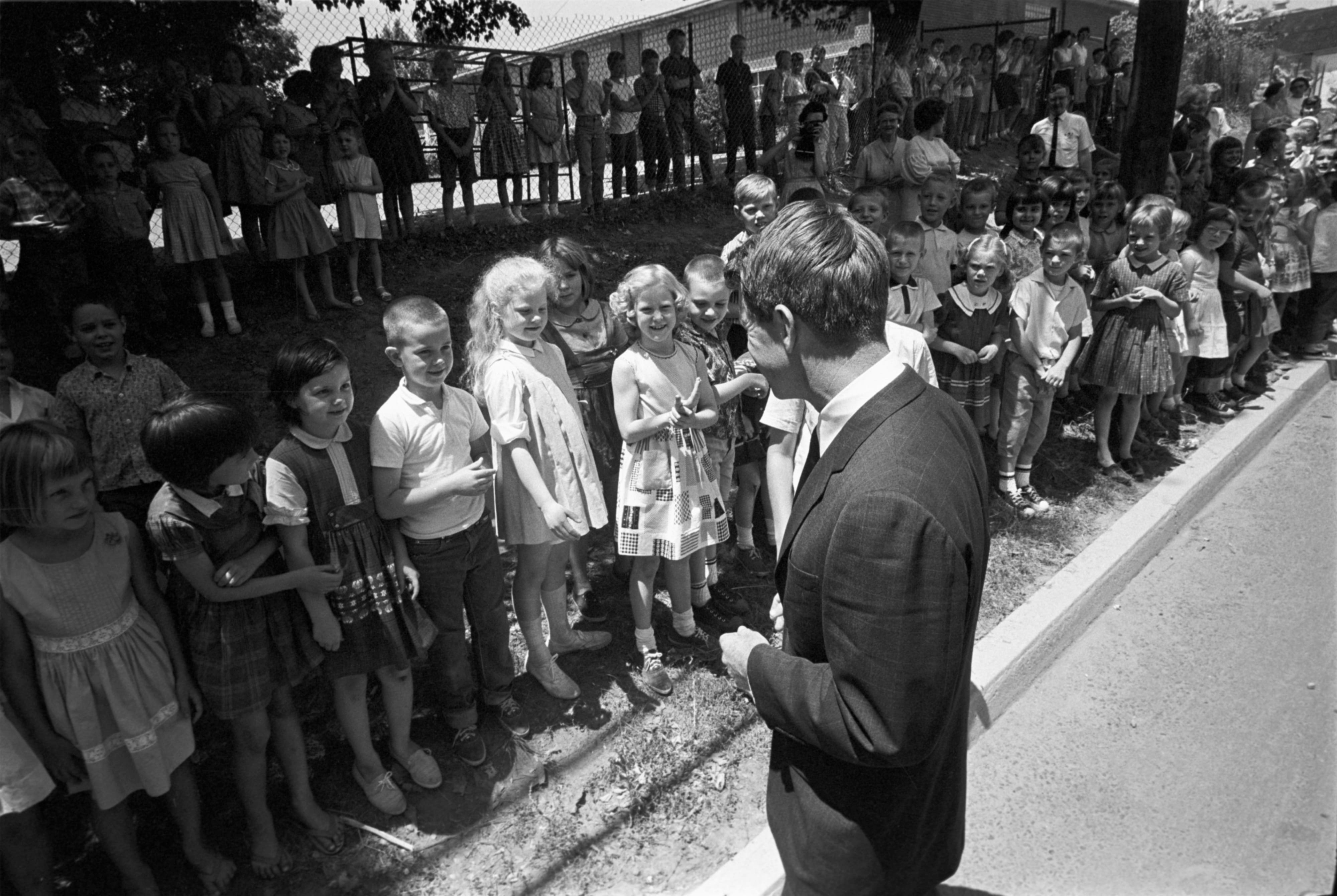 Robert Kennedy visiting the children of the Maple Street School