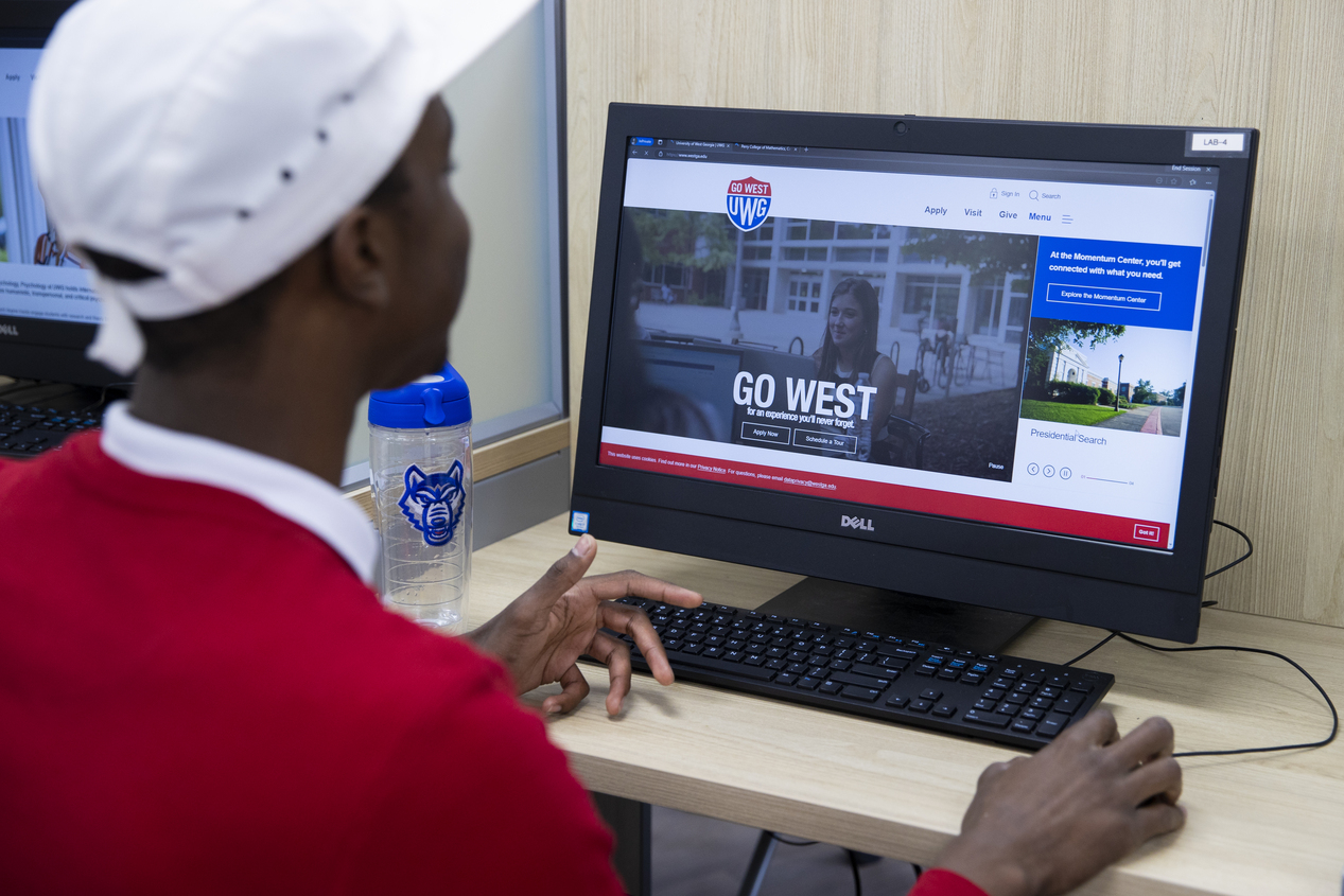 student at a computer