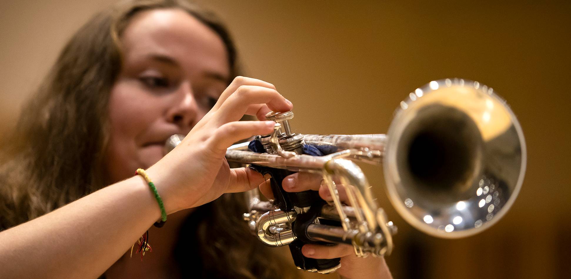 student playing flute in band