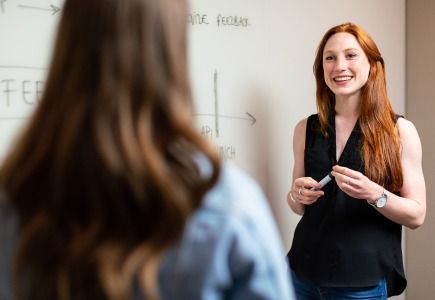 Professor talking to student