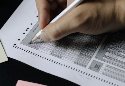 Student filling out bubble sheet