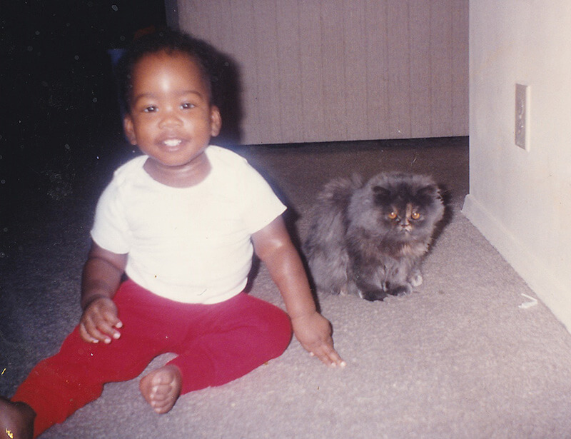 Gibbs as a child with pet, BooBoo Kitty