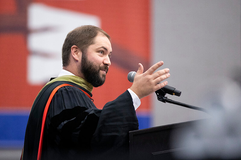 Brad Mock ’12 ’15 at commencement