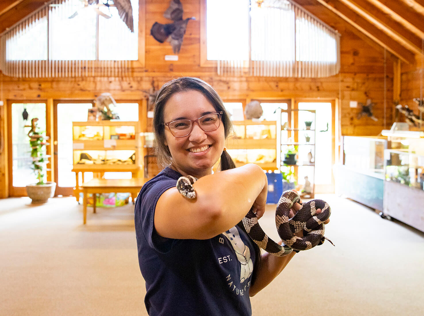UWG alumna Joanne Wasdin holding a snake