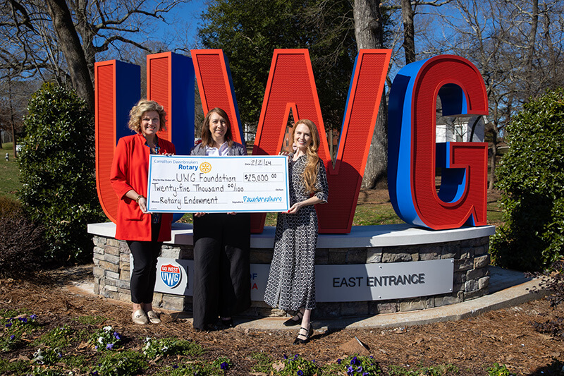 L to R: Allyson Bretch ’14, interim vice president for university advancement and interim CEO of UWG’s philanthropic foundations; Jessica Ainsworth ’06 ’16, Carrollton Dawnbreakers president; and Sarah Powell, UWG assistant vice president and chief of staff