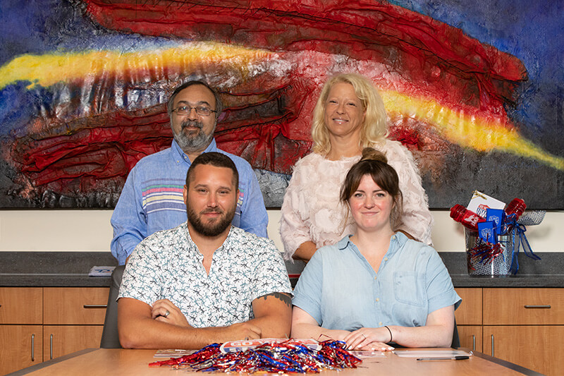 Front: Chris Crittenden and Shastina Oglesbee Crittenden; Back: Drs. Farooq Khan and Anne Gaquere-Parker, professors of Chemistry