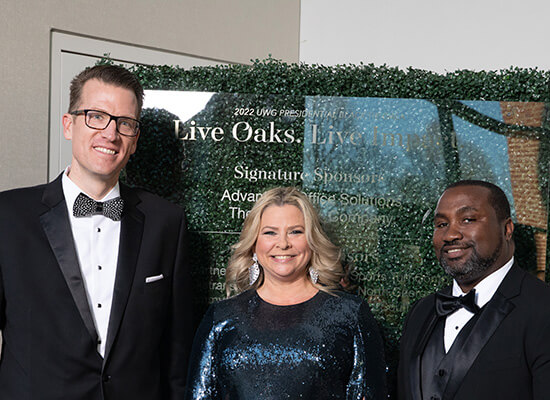 L to R: Dr. Brendan Kelly, UWG president; Christa Pitts; Dr. Chris Johnson, UWG Richards College of Business dean