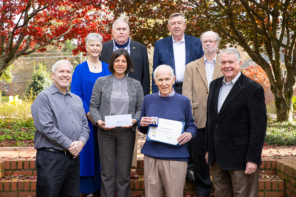 Front row: Dr. Keith Pacholl, UWG professor of history; Ketty Cusick, UWG senior director of development; Dr. John Ferling, UWG professor emeritus of history; Dr. Mike Campbell '75 '77 '85, Casimir Pulaski-GSSAR secretary/treasurer. Back row: Sue Carlton; Edward Carlton; Lt. Cdr. Jimmy G. Swinson USN (Ret.) '70, Casimir Pulaski-GSSAR president; George Wheeless '94 '97, Casimir Pulaski-GSSAR registrar