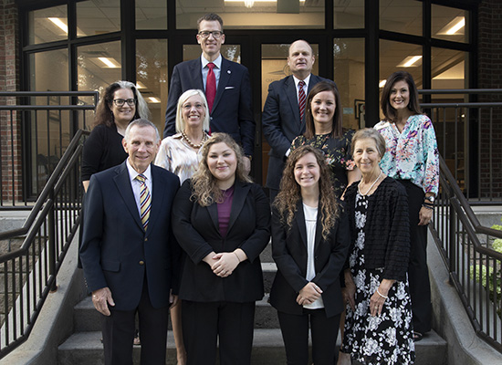 Back row (L to R): Dr. Brendan Kelly, UWG president; Dr. Mark Albertus, CCS superintendent. Middle row (L to R): Shelly Elman, UWG chair of English, film, languages and performing arts; Dr. Meredith Brunen, UWG vice president of University Advancement; Laurie Fleck, CCS marketing and community engagement director; Dr. Anna Clifton, CCS assistant superintendent of Teaching and Learning. Front row (L to R): Larry Frazier; Rebecca Parris, recipient; Rachel Breaux, recipient; Mary Lynn Frazier.