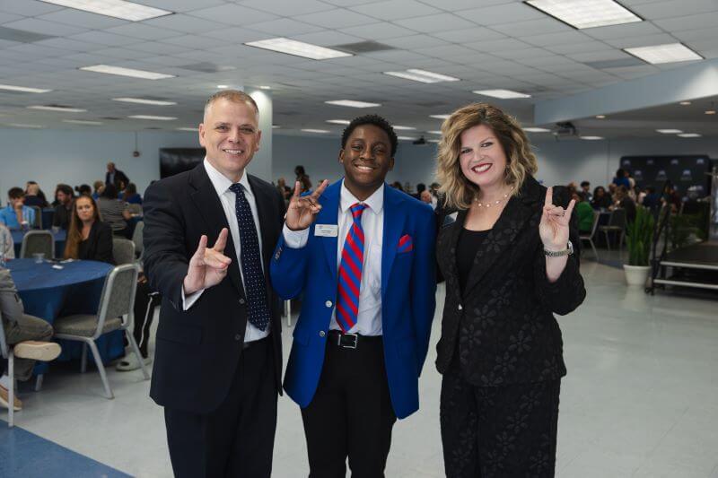 L to R: Dr. Michael Johnson, UWG president; Leonard Bowles, UWG student and scholarship recipient; and Allyson Bretch, vice president for university advancement and CEO of UWG’s philanthropic foundations