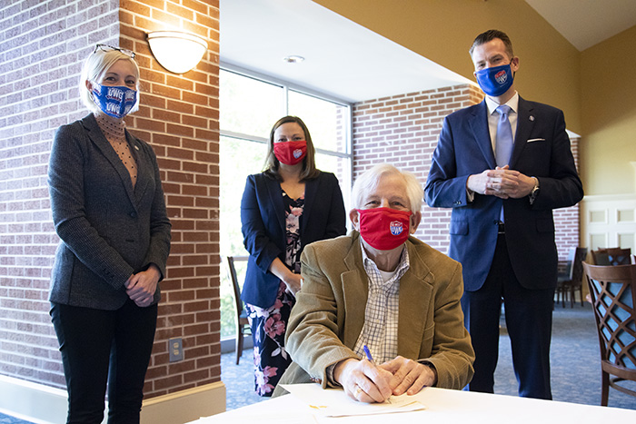 L. to R.: Dr. Meredith Brunen, vice president for University Advancement, CEO of UWG Foundations; Nichole Fannin '05 '10, executive director of development; Dr. Joseph “Harrison” McCraw Jr.; Dr. Brendan B. Kelly, UWG president