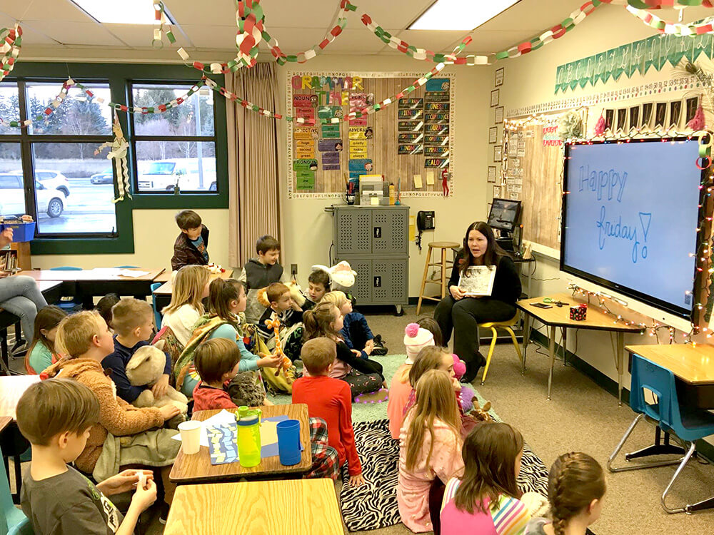 Dr. Laurie Barron reading to children