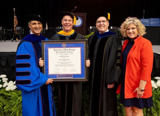 L to R: Dr. Ashwani Monga, UWG interim president; Rusty West; Dr. John Preston, UWG provost; Allyson Bretch, vice president for University Advancement and CEO of UWG Philanthropic Foundations