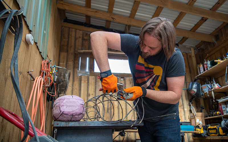 Jesse Duke works in his shop