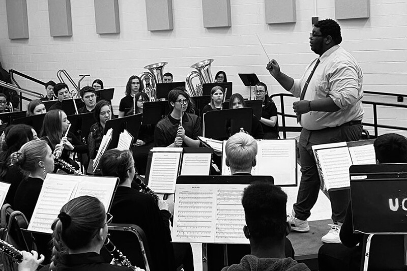 Katahj Copley conducting a band