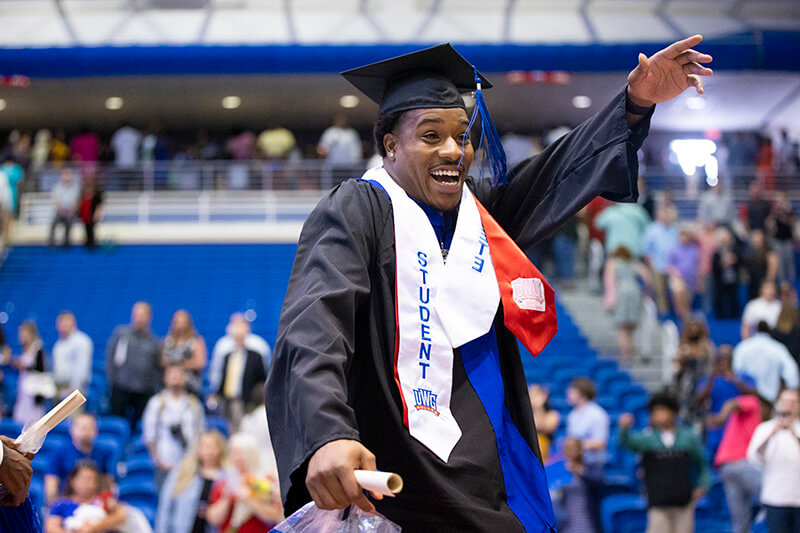 Student celebrating at graduation