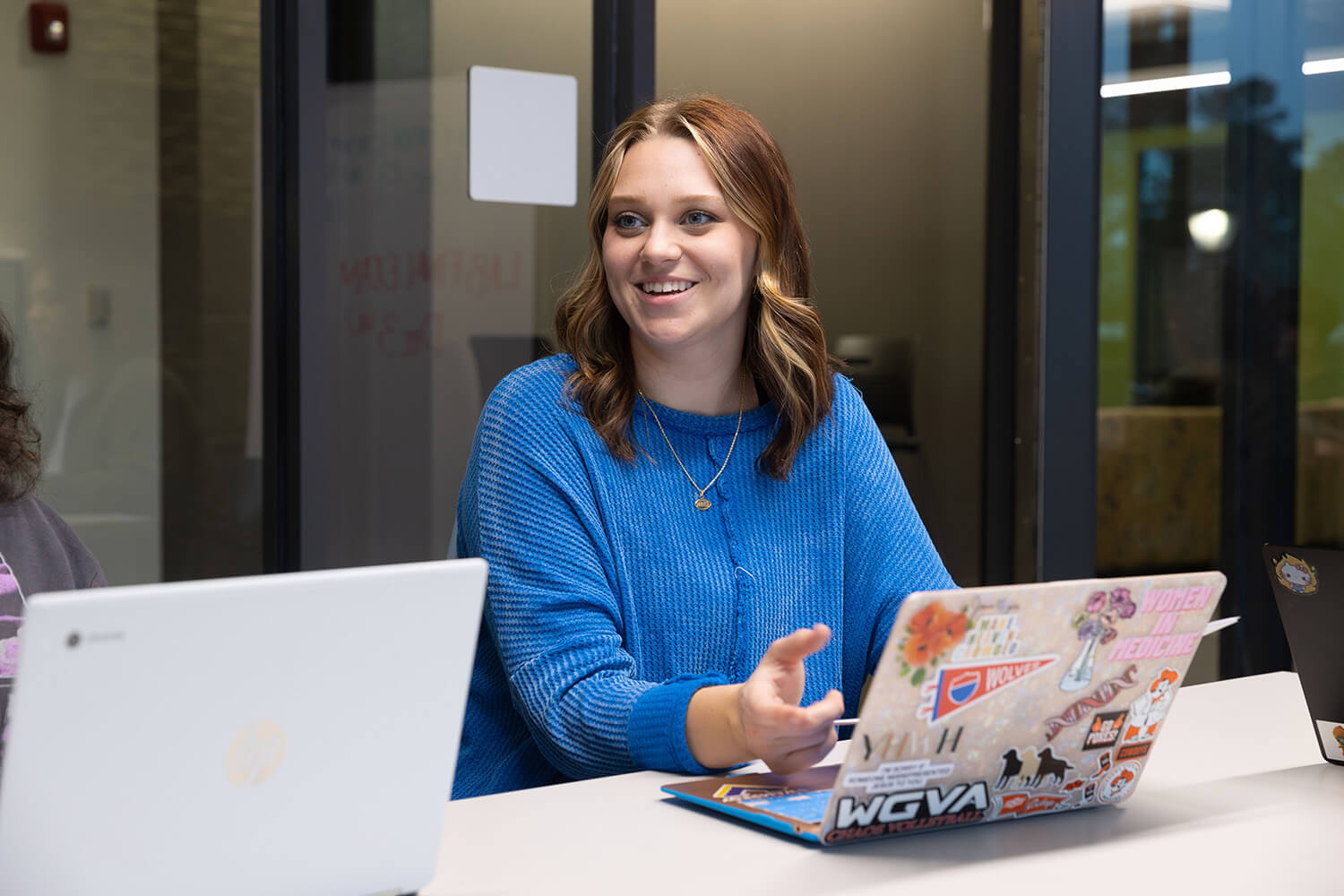 UWG student working on a laptop