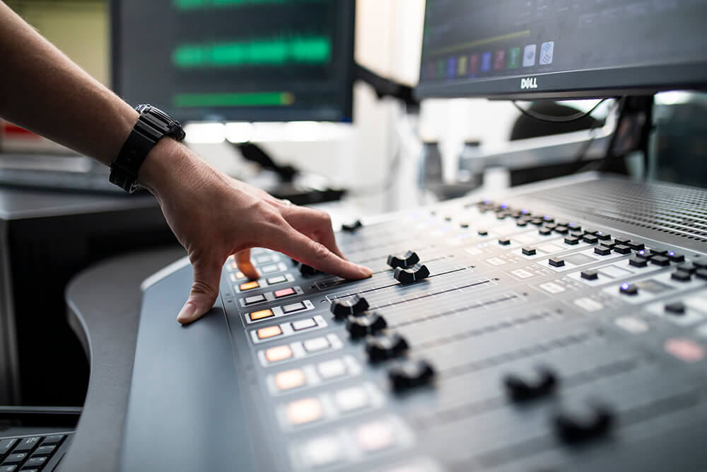 Man's hands at radio controls