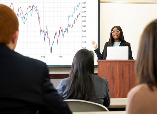 Student gives a presentation in front of class