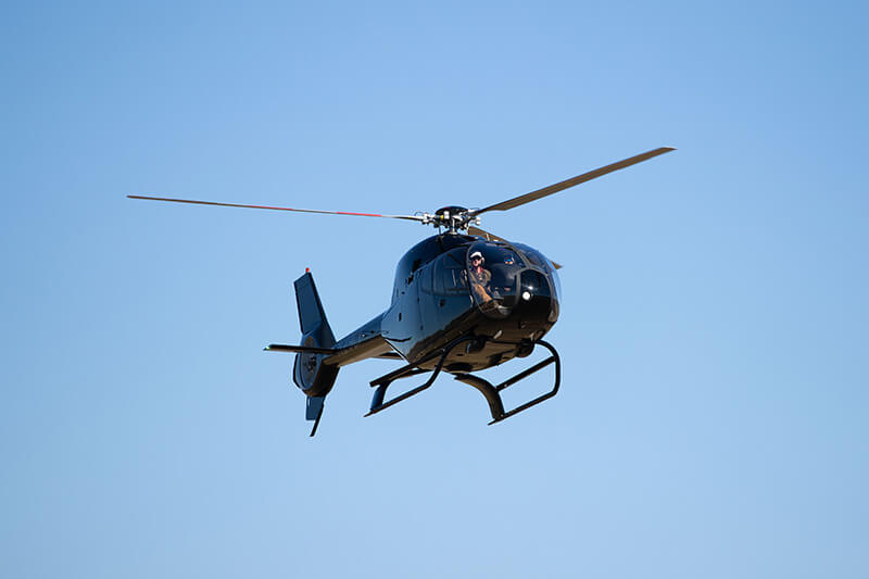 Lance Toland looks down on the crowd before landing.