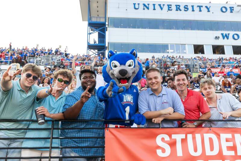 UWG Wolves fans with mascot Wolfie