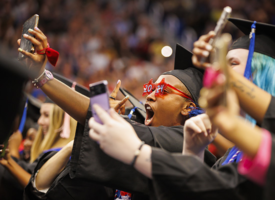 Graduates celebrating at UWG's spring commencement