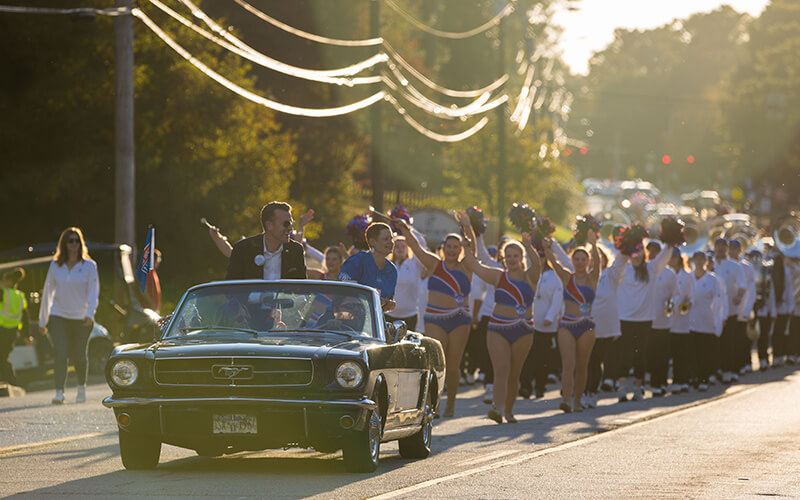 UWG President Brendan Kelly and First Lady Tressa Kelly wave to supporters during Homecoming parade