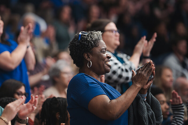 UWG employee clapping at the State of the University
