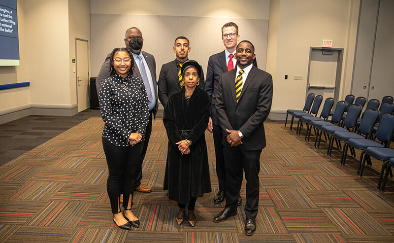Front row: Sydney Severin, UWG SGA president; Jawana Jackson; and Rahmel Cowen, UWG director of strategic initiatives. Back row: Dr. Andre Fortune, UWG vice president of student affairs; Trent McRae, president of Alpha Phi Alpha Fraternity, Inc.; and Dr. Brendan Kelly, UWG president