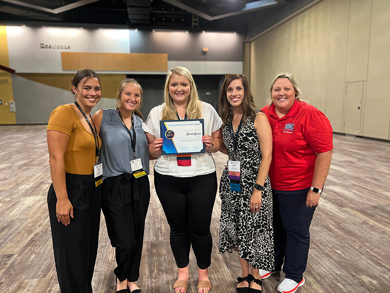 Sarah Gross with students and NWI Director of Professional Development