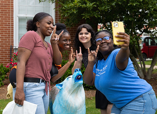 A group of UWG students outside on campus