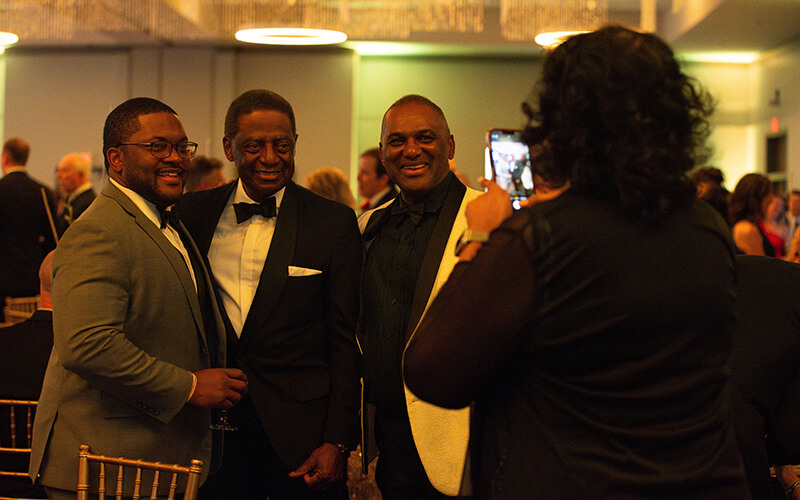 Celebrants posing for a picture at UWG's Presidential Black Tie Gala