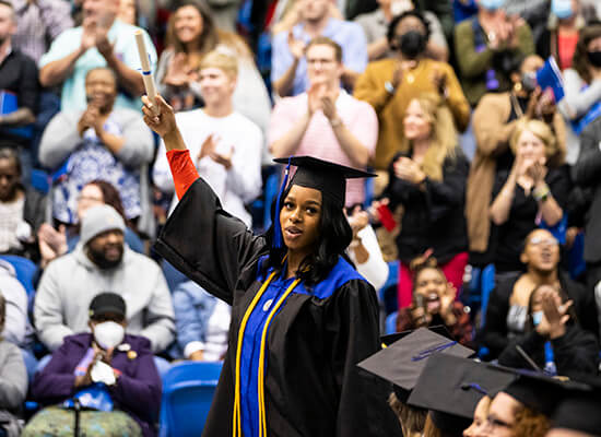 A graduate at UWG's fall commencement ceremony