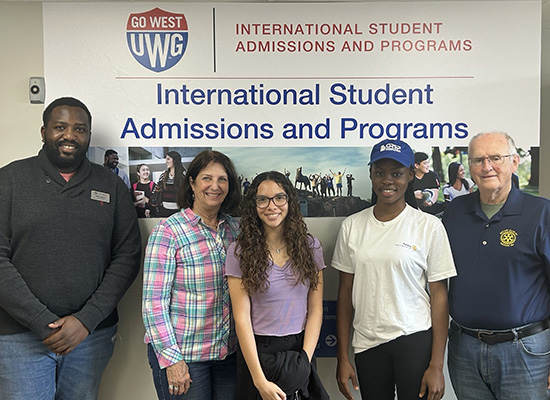 L to R: Misheck Malangano, UWG; Lynn Clarke, Rotary; Ana Paula Ruiz Burkart, UWG scholarship recipient; Favour Onwanuo, UWG scholarship recipient; George Siggins, Rotary