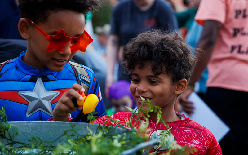 kids in costume playing a game