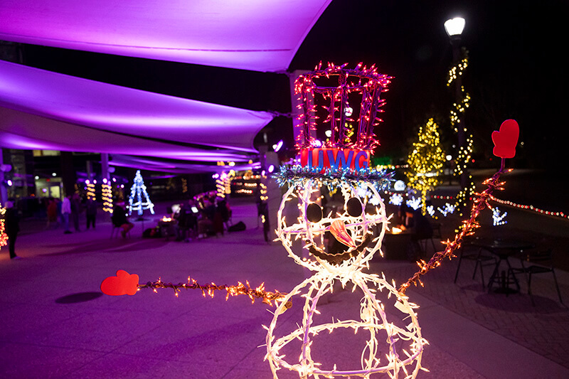 A light-up snowman wearing a UWG hat