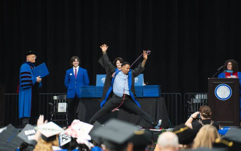 UWG graduate dances at Spring Commencement 