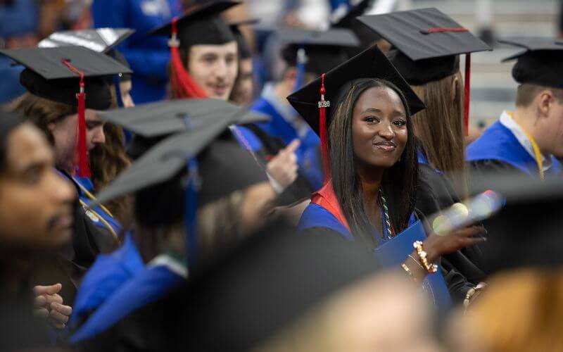 UWG graduate smiles at Spring Commencement 