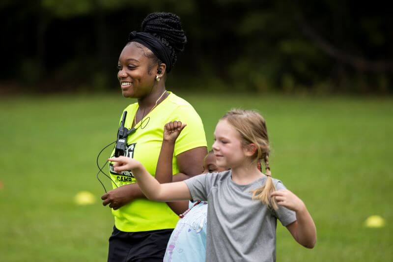 Kid and counselor participate in UWG Summer Camp