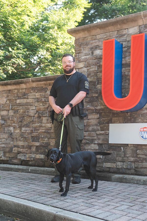 UPD's Dylan Detman and K9 Bru