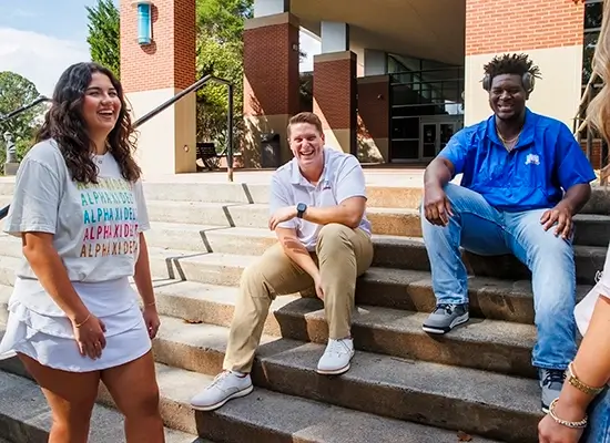 Three UWG students outside the Campus Center