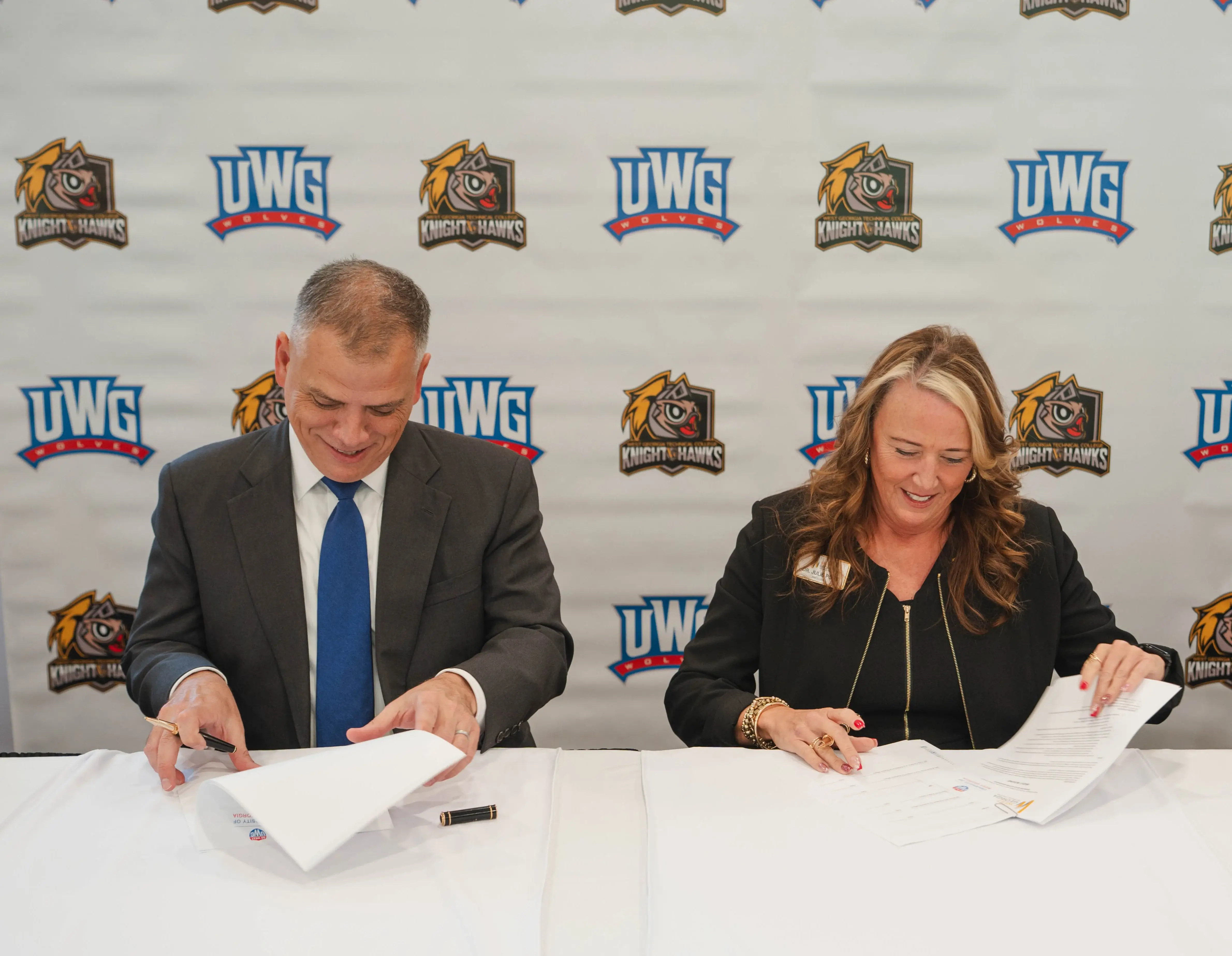 UWG's Dr. Michael Johnson and WGTC's Dr. Julie Post sign the articulation agreement