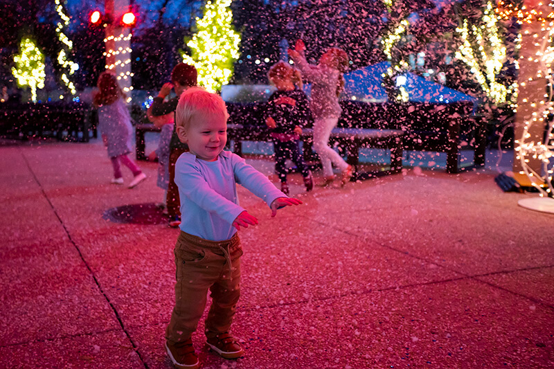 Child playing in the snow