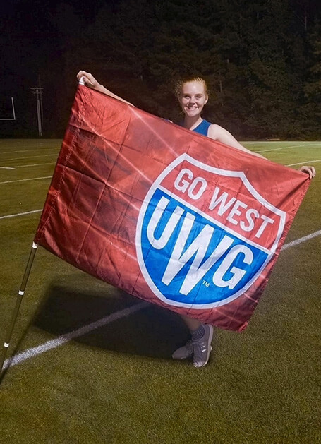 Rogers on RA-LIN Field in University Stadium as a member of the color guard