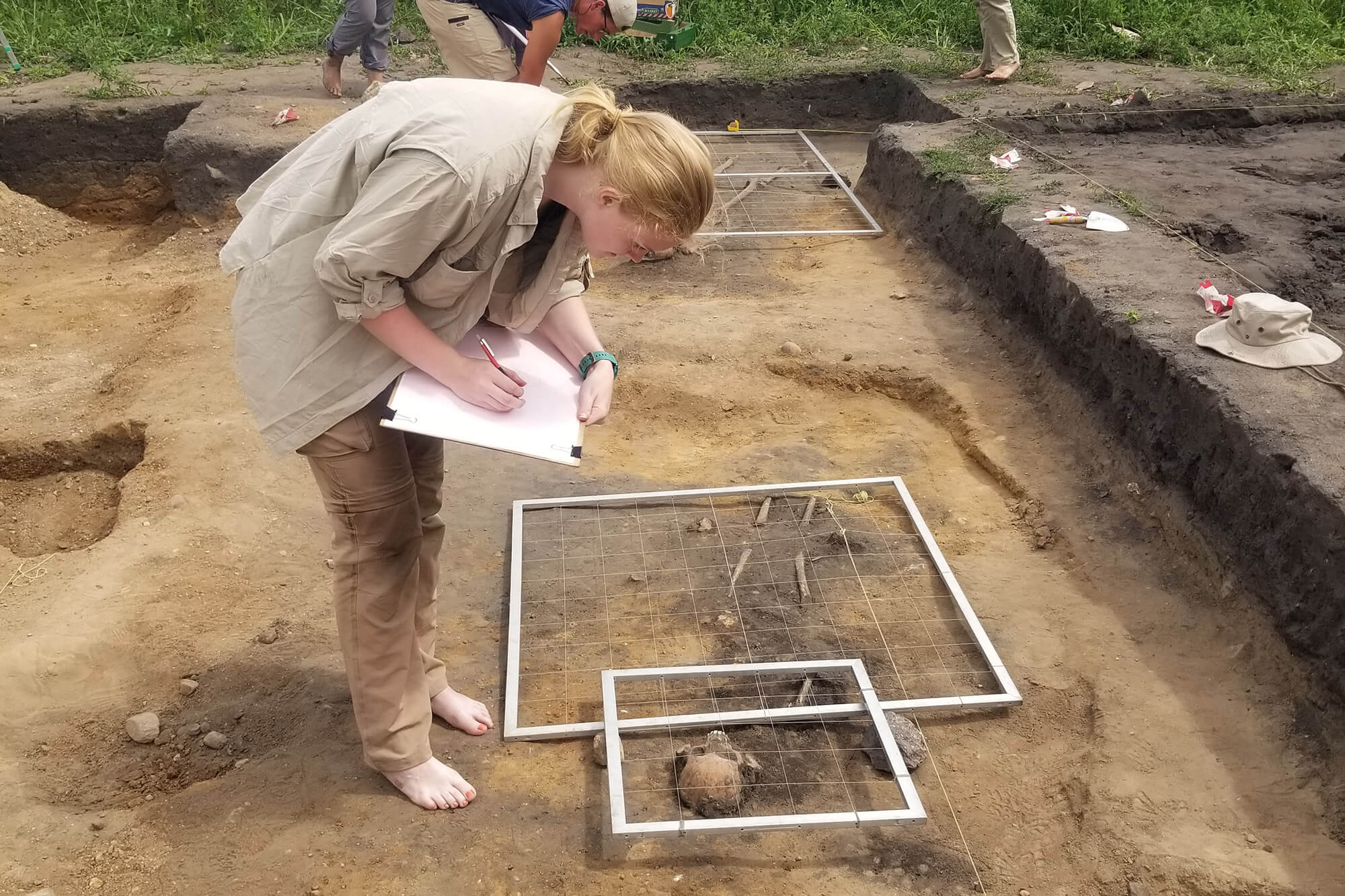 Rogers and other students mapping a grave in Giecz, Poland.