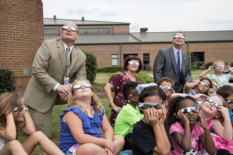 UWG President Dr. Kyle Marrero and community members