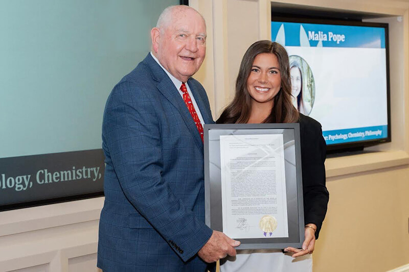 Malia Pope with Dr. Sonny Perdue, USG chancellor