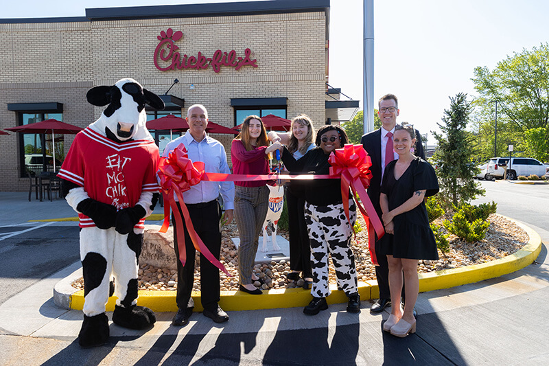 From left to right: David Daniels, Carrollton Chick-fil-A owner/operator; Ilona Kish, UWG student-artist; Reese Scott, UWG student-artist; Leah Jackson, UWG student-artist; Dr. Brendan Kelly, UWG president; and Brandy Barker, UWG faculty and executive director for creative services. 
