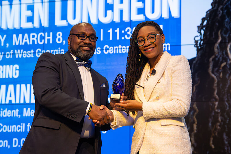 Dr. Chris Johnson, UWG Richards College of Business dean, and Tramaine EL-Amin, Women Empowering Women keynote speaker 